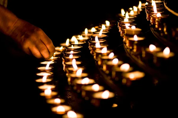 Candle light in a church — Stock Photo, Image