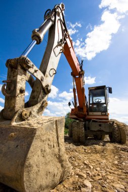 Bulldozer in action clipart