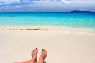 Feets on white beach clipart