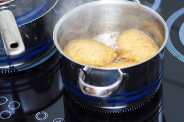 Potato boiling in water clipart