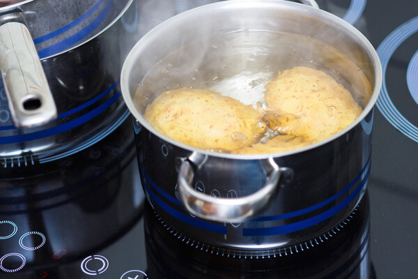 Potato boiling in water