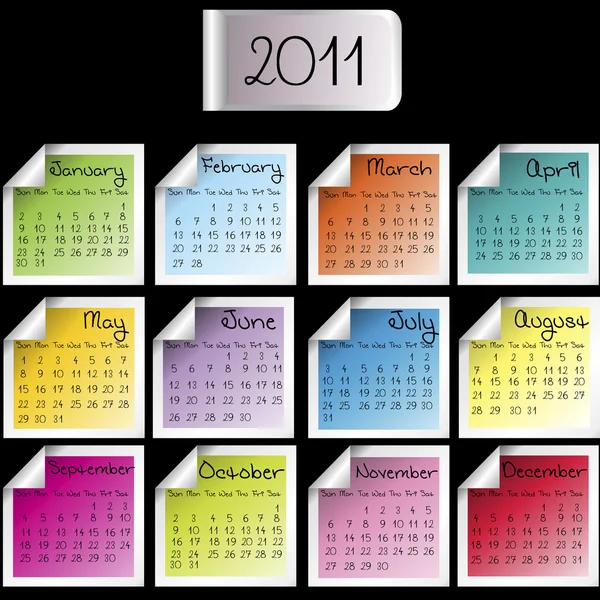 2011 calendario su fogli colorati su sfondo nero — Foto Stock