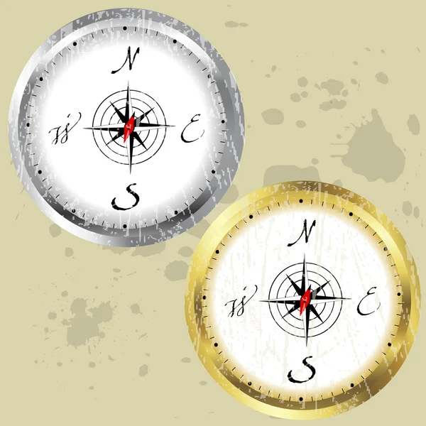 Набір срібних і золотих компасів — стокове фото