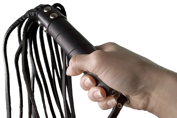 Flogging Whip in woman's hand — Stock Photo, Image