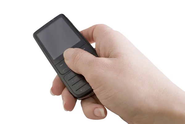Teléfono móvil en una mano en un respaldo blanco — Foto de Stock