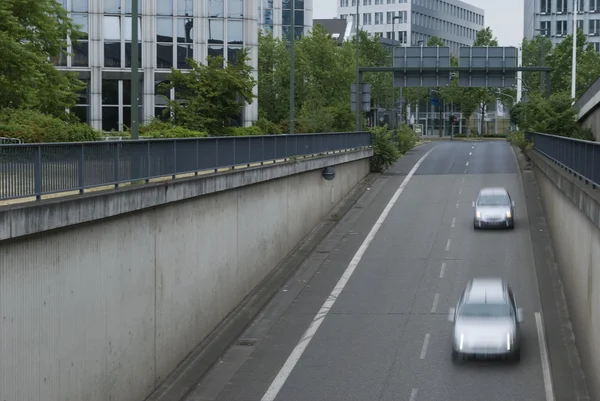 stock image Vehicles drive into the tunnel