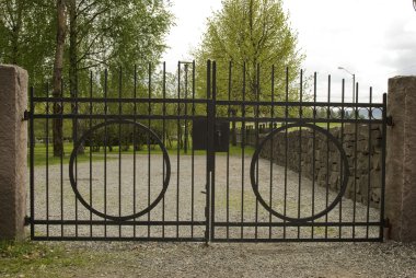 Iron cemetery gate. clipart