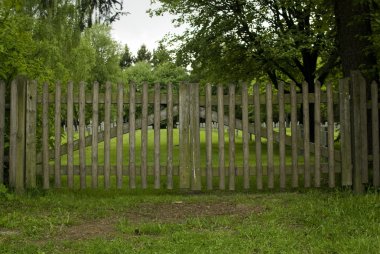 The old wooden gate. clipart