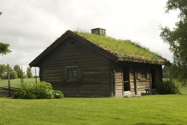 Old farmer's wooden house museum Gamle Hvam. clipart