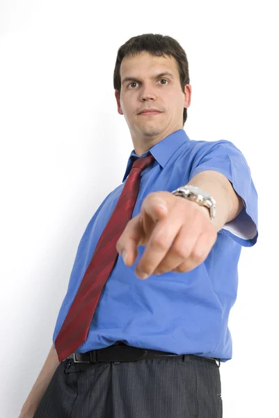 Angry young businessman pointing down. — Stock Photo, Image