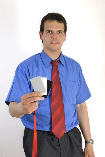 Businessman holding grey card. — Stock Photo, Image