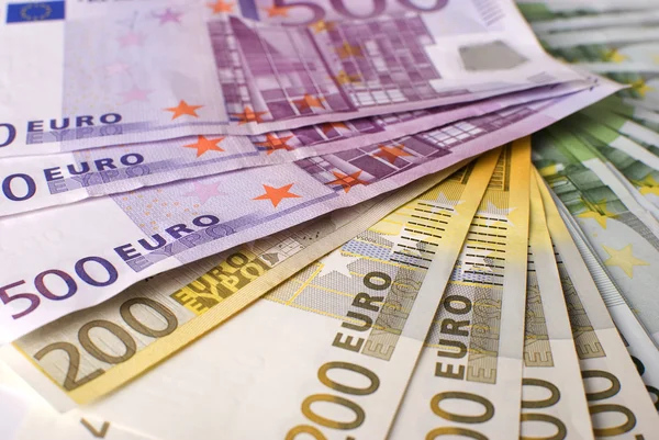Close-up da ventoinha Notas e moedas de euro . — Fotografia de Stock