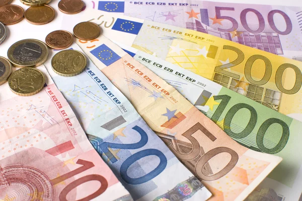 Close-up of the fan Euro banknotes and coins. — Stock Photo, Image