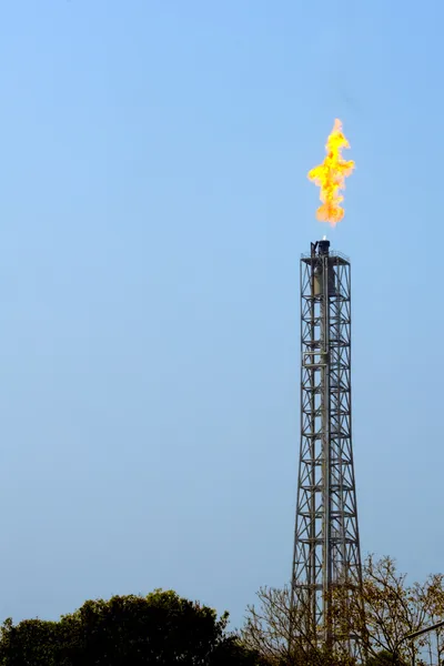 Stock image A flare stack burning off excess gas