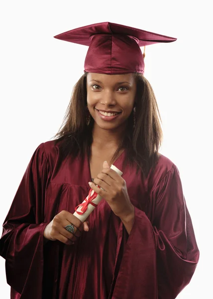 Graduada universitaria en gorra y bata —  Fotos de Stock