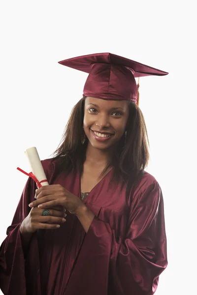 Feminino faculdade graduado em cap e vestido — Fotografia de Stock