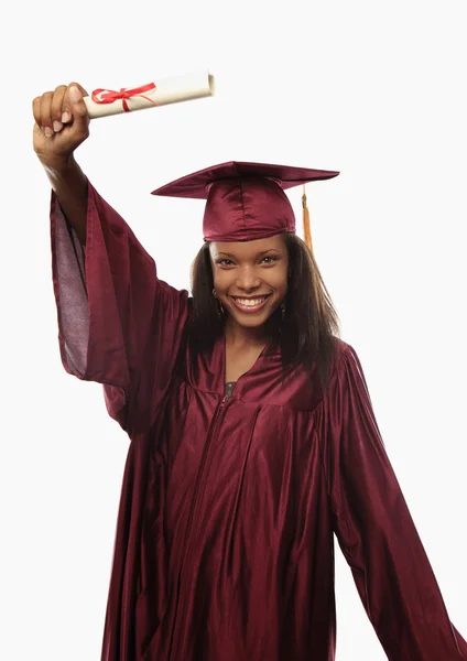 Kvinnliga college examen i mössa och klänning — Stockfoto