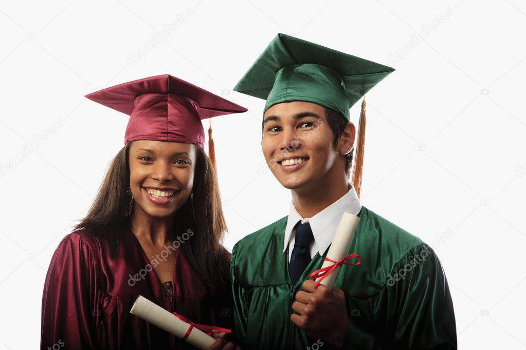 Multi racial couple in cap and gown