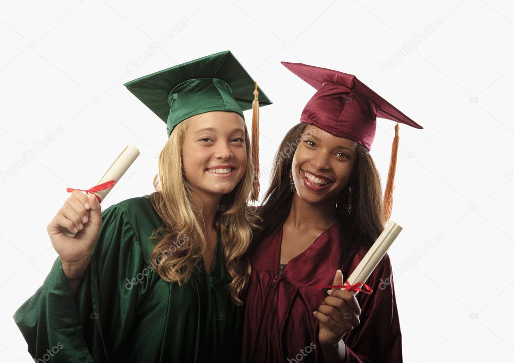 Two female graduates in cap and gown