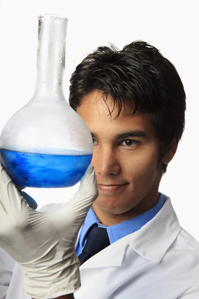 Lab technician holding a flask — Stock Photo, Image