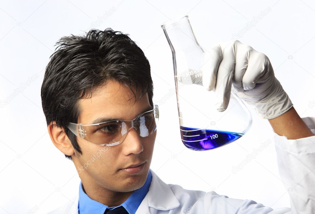 Lab technician holding a flask