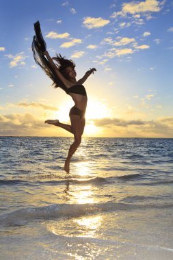 Black female dancer leaping in the air clipart