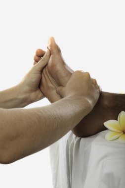 Healing touch of a masseuse's hands clipart