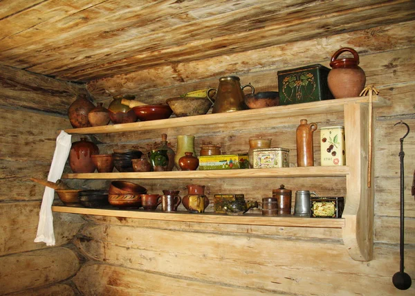 Ancient shelf for kitchen utensils. — Stock Photo, Image