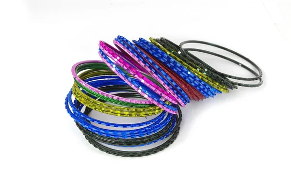 Coloured metallic bracelet rings — Stock Photo, Image