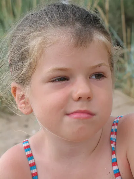 Little girl on a beach — Stock Photo, Image