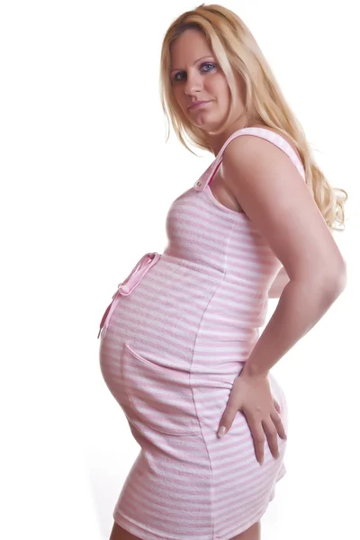 Gravid kvinna anläggning mage — Stockfoto