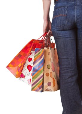 Woman holding shopping bags clipart