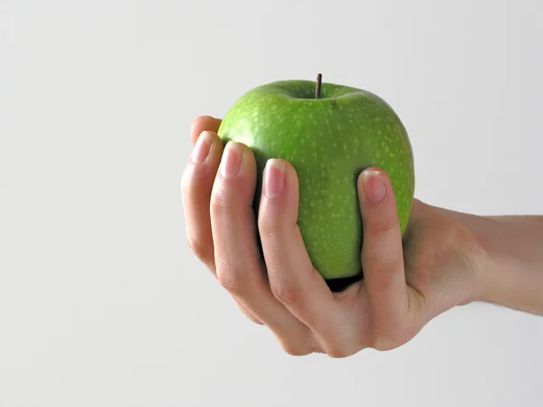 Apple in der Hand — Stockfoto