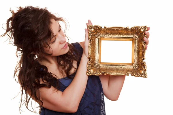 Mujer sosteniendo un marco de imagen —  Fotos de Stock