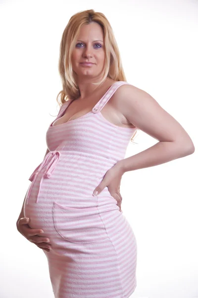 Kobieta w ciąży brzuch gospodarstwa — Zdjęcie stockowe