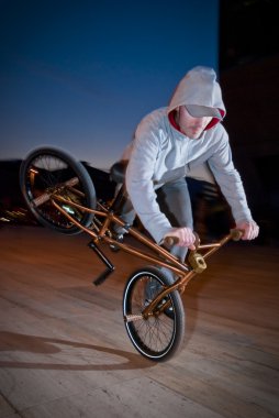 Bmx training at night clipart