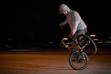 Bmx training at night clipart