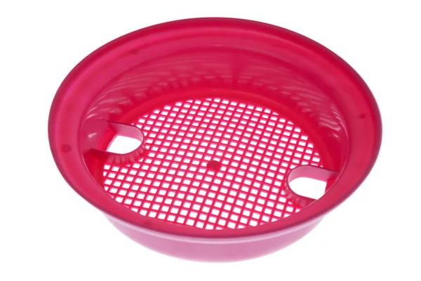 Розовое пластиковое решето — стоковое фото