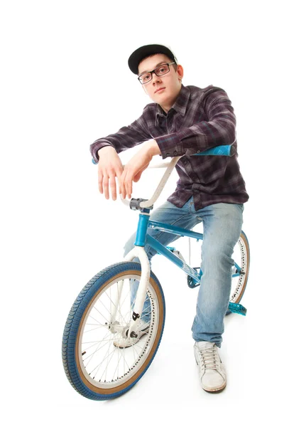 Молодий хлопець з велосипедом ізольований Стокове Фото
