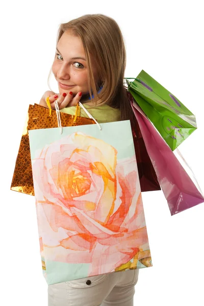 Krásná mladá dívka s balíčky — Stock fotografie