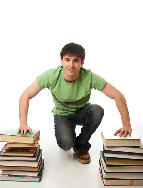 O jovem estudante isolado em um branco — Fotografia de Stock