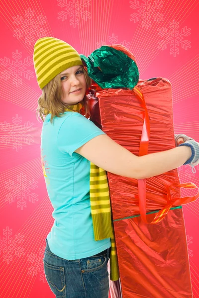 The young attractive girl with the gift — Stock Photo, Image