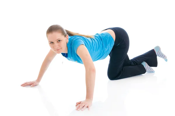 Egzersiz yaparak genç kadın — Stok fotoğraf