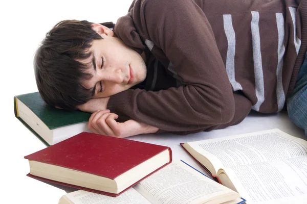 Den sovande studenten med böcker — Stockfoto