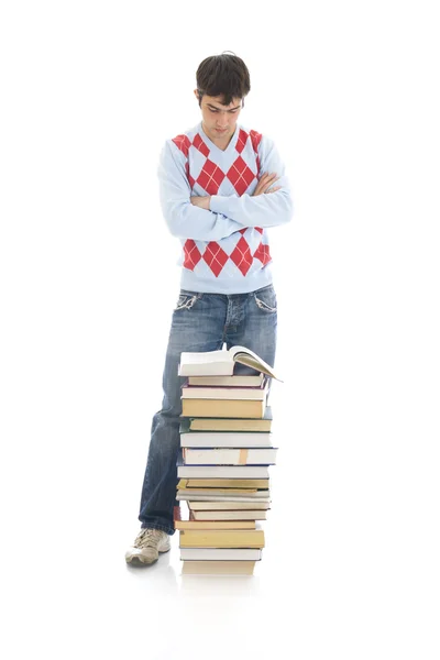O jovem estudante com os livros — Fotografia de Stock