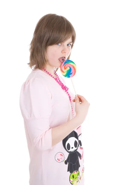 La chica con un dulce de azúcar — Foto de Stock
