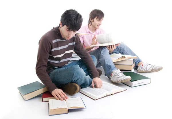 De två studenterna med böcker — Stockfoto