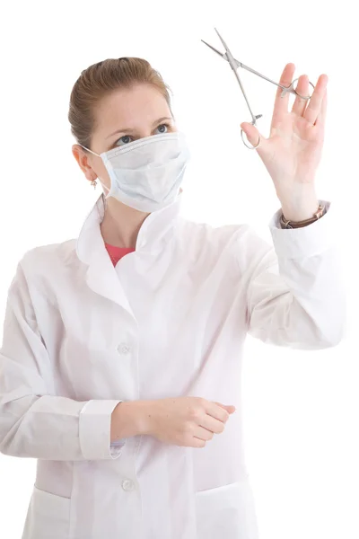 The young nurse with scissors — Stock Photo, Image