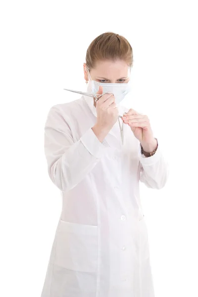 The young nurse with scissors — Stock Photo, Image