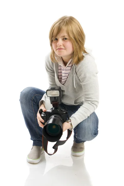 Den unga flickan med kameran Royaltyfria Stockfoton